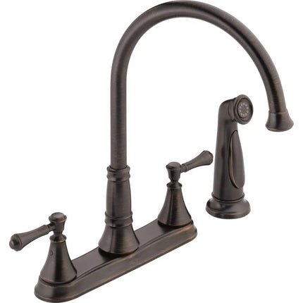 Delta Cassidy 2H Kitchen Deck Faucet W/Sprayer 2497LF-RB - Plumbing Market