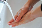 A person thoroughly washing their hands with soap and water at a sink, promoting hygiene and cleanliness, using high-quality Bathtub and Shower Faucets to ensure optimal water flow and control.
