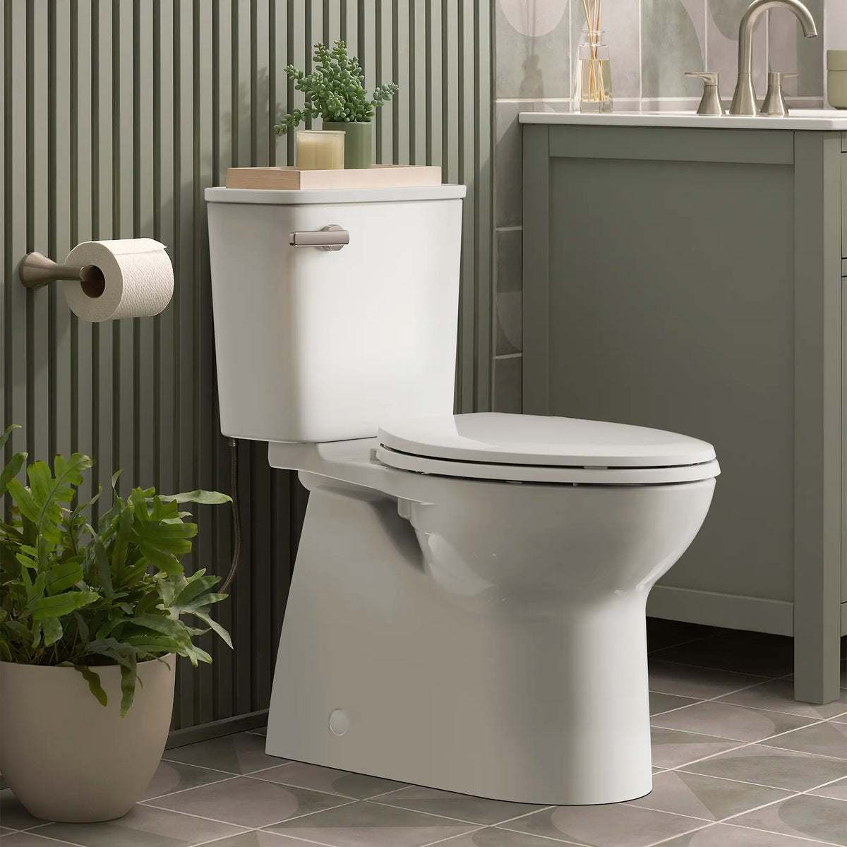 American Standard Aspirations Two-Piece Concealed 1.28 gpf/4.8 Lpf Chair Height Elongated Toilet With Seat