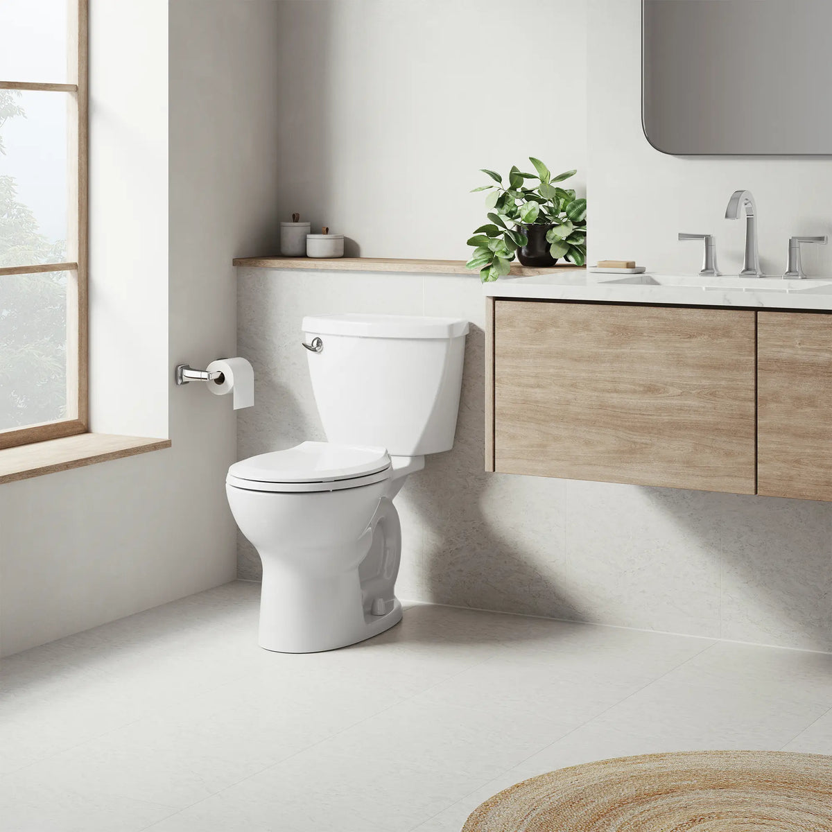 American Standard Cadet 3 Two-Piece 1.28 gpf/4.8 Lpf Standard Height Round Front Complete Toilet With Seat and Lined Tank