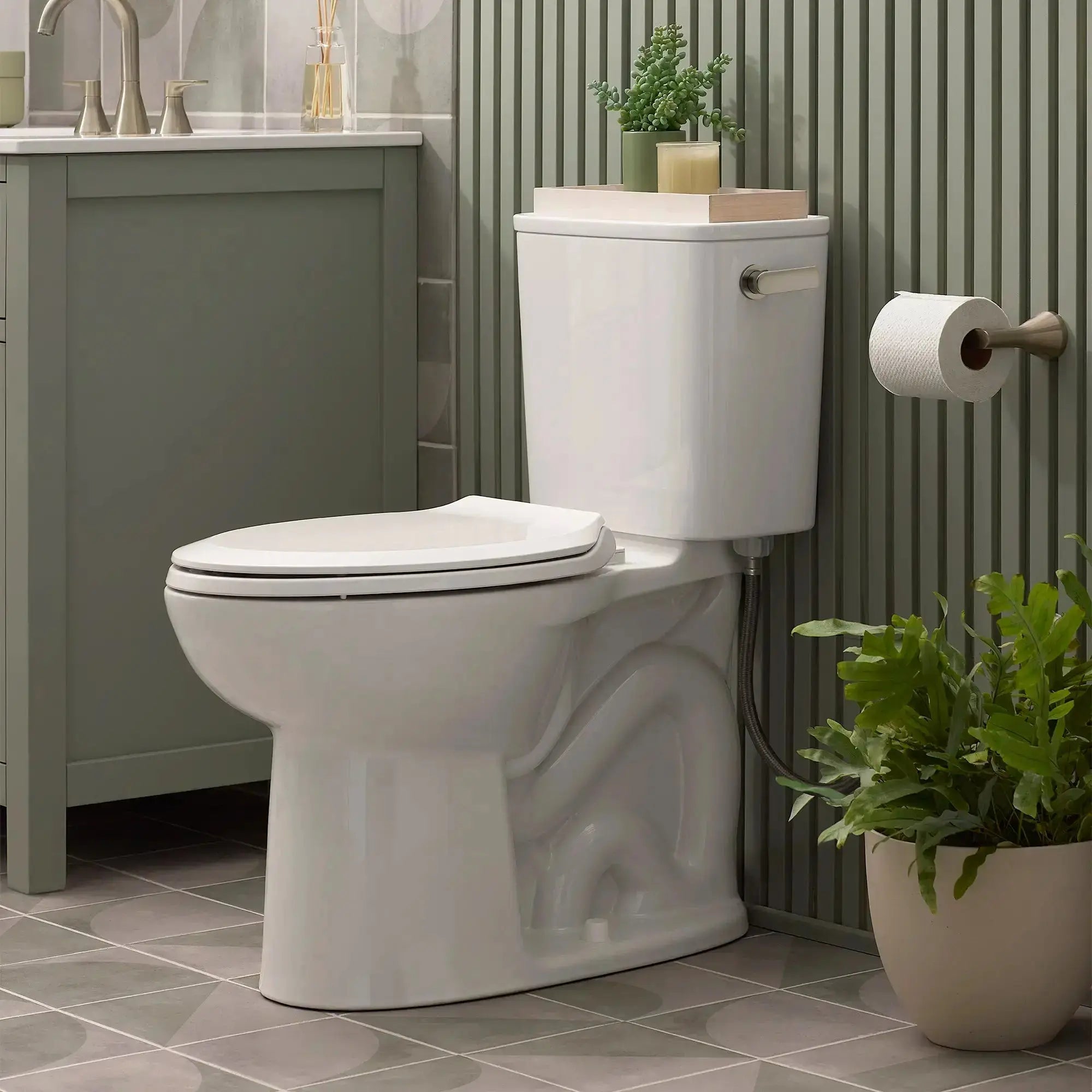 American Standard Aspirations EcoStrength Two-Piece Chair Height Elongated Right-Hand Trip Lever Toilet Less Seat - Plumbing Market