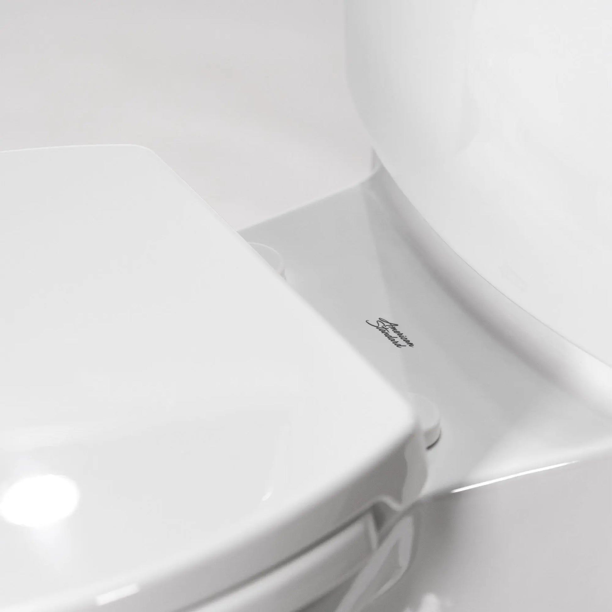 American Standard Studio Touchless Skirted Elongated Toilet with Seat - Plumbing Market