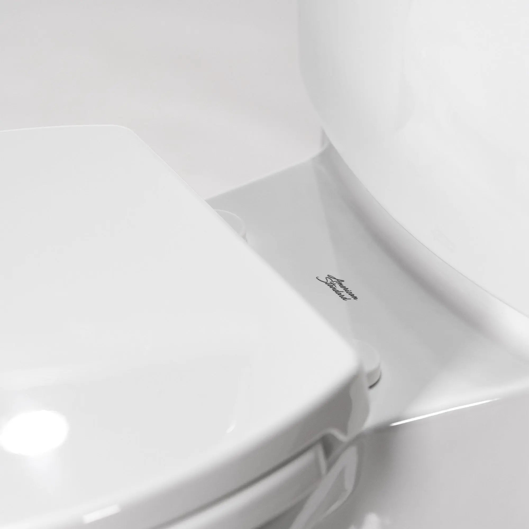 American Standard Studio Touchless Skirted Elongated Toilet with Seat - Plumbing Market