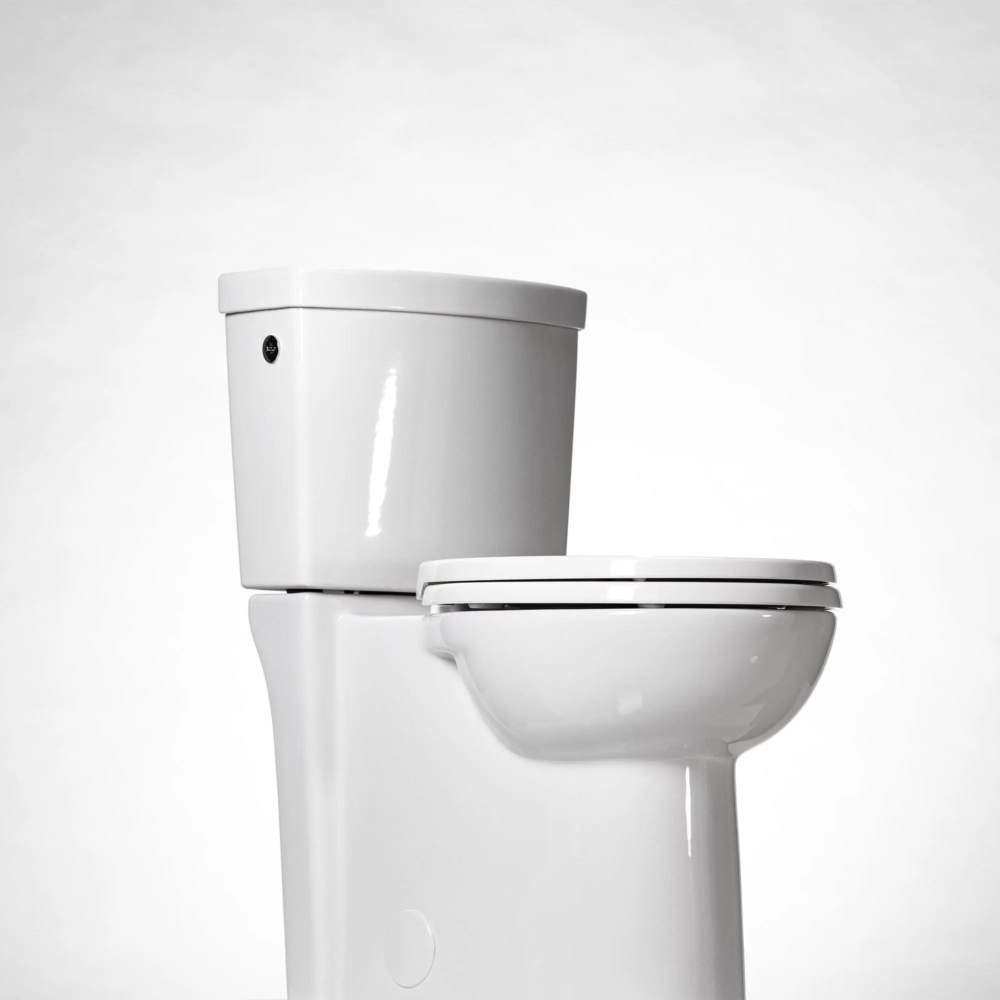 American Standard Studio Touchless Skirted Elongated Toilet with Seat - Plumbing Market