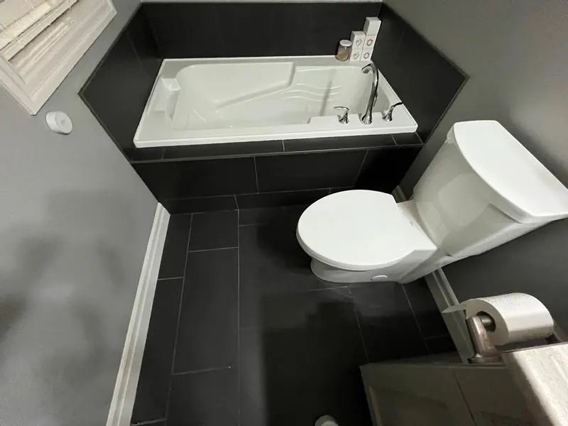 American Standard Studio Touchless Skirted Elongated Toilet with Seat - Plumbing Market