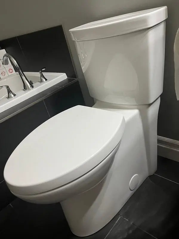 American Standard Studio Touchless Skirted Elongated Toilet with Seat - Plumbing Market