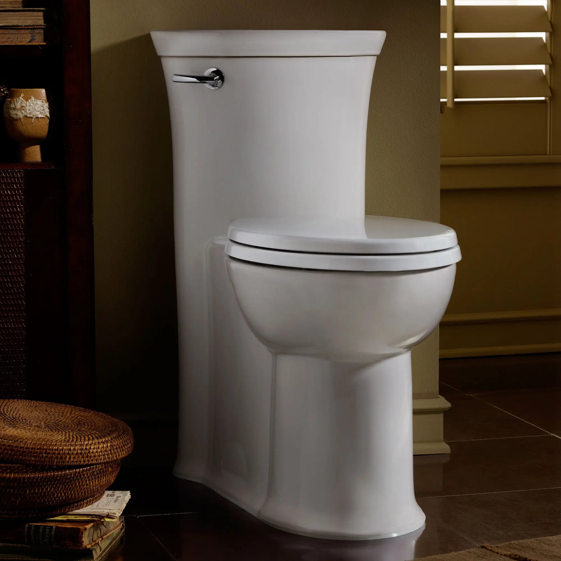 American Standard Tropic 1.28 gpf Chair Height Elongated Toilet With Seat - Plumbing Market
