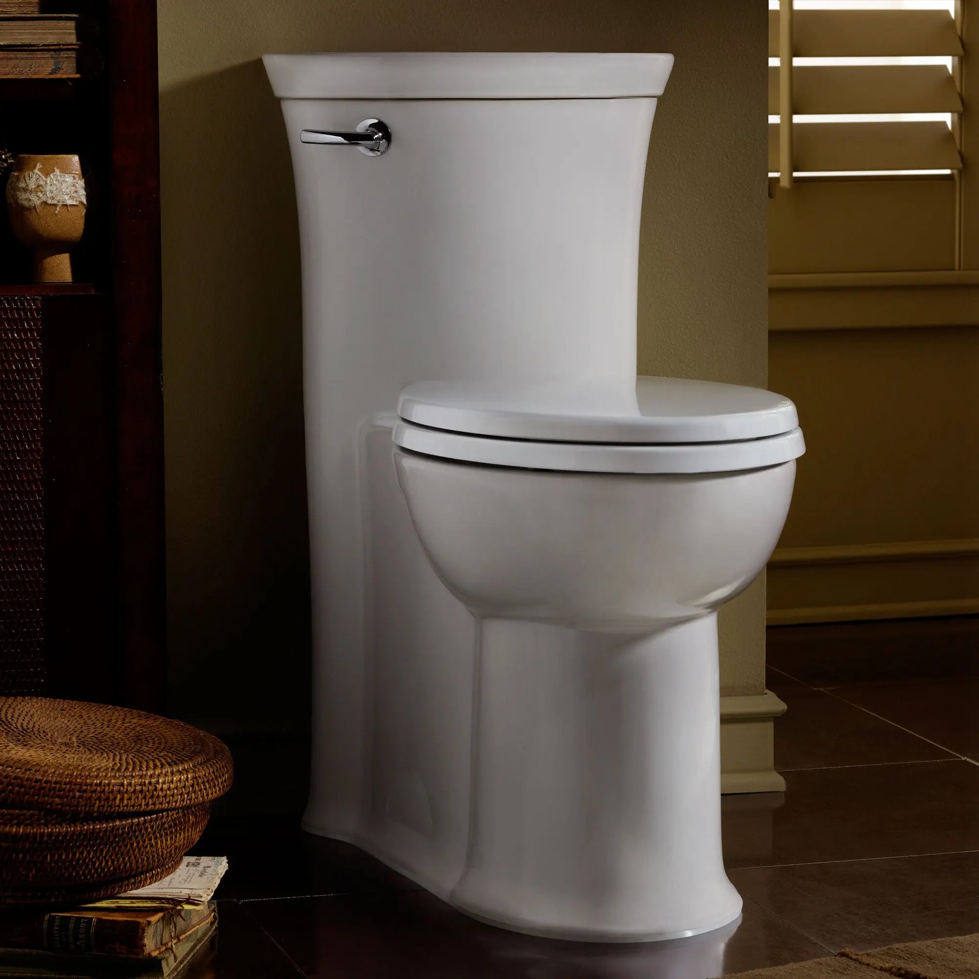 American Standard Tropic 1.28 gpf Chair Height Elongated Toilet With Seat - Plumbing Market
