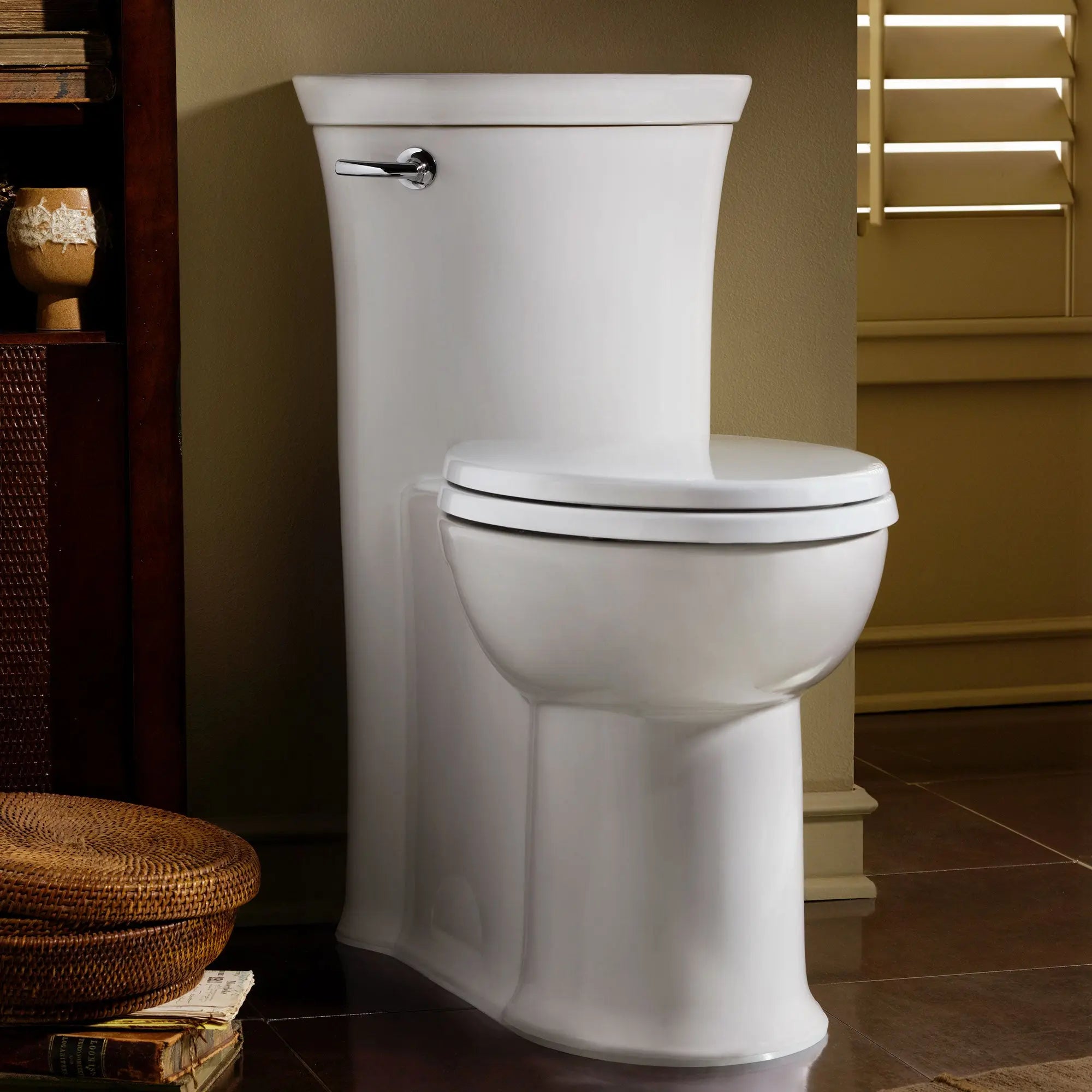 American Standard Tropic 1.28 gpf Chair Height Elongated Toilet With Seat - Plumbing Market