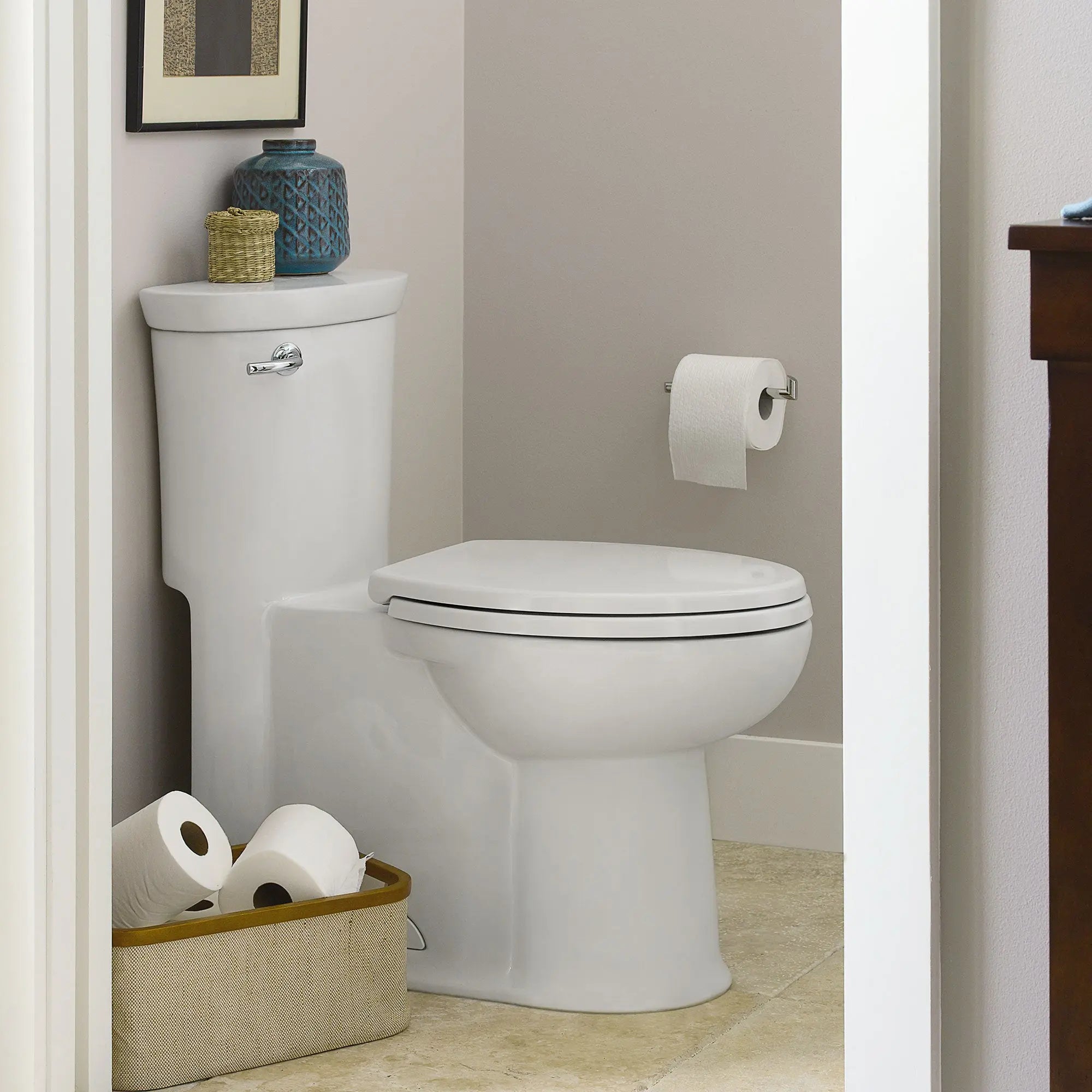 American Standard Tropic 1.28 gpf Chair Height Elongated Toilet With Seat - Plumbing Market