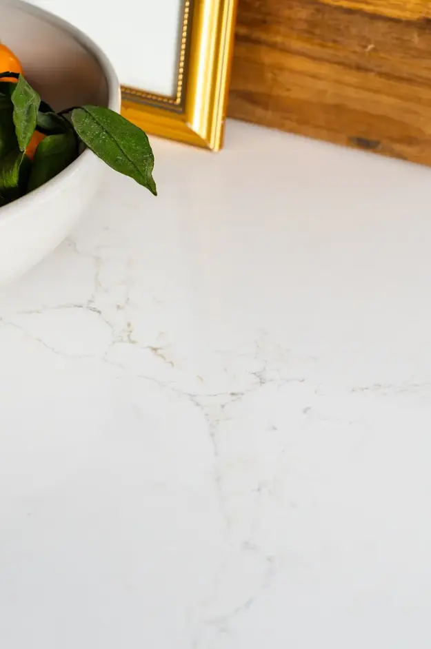 Hanstone Antello Elegant White Quartz with Soft Grey & Gold Veining - Plumbing Market