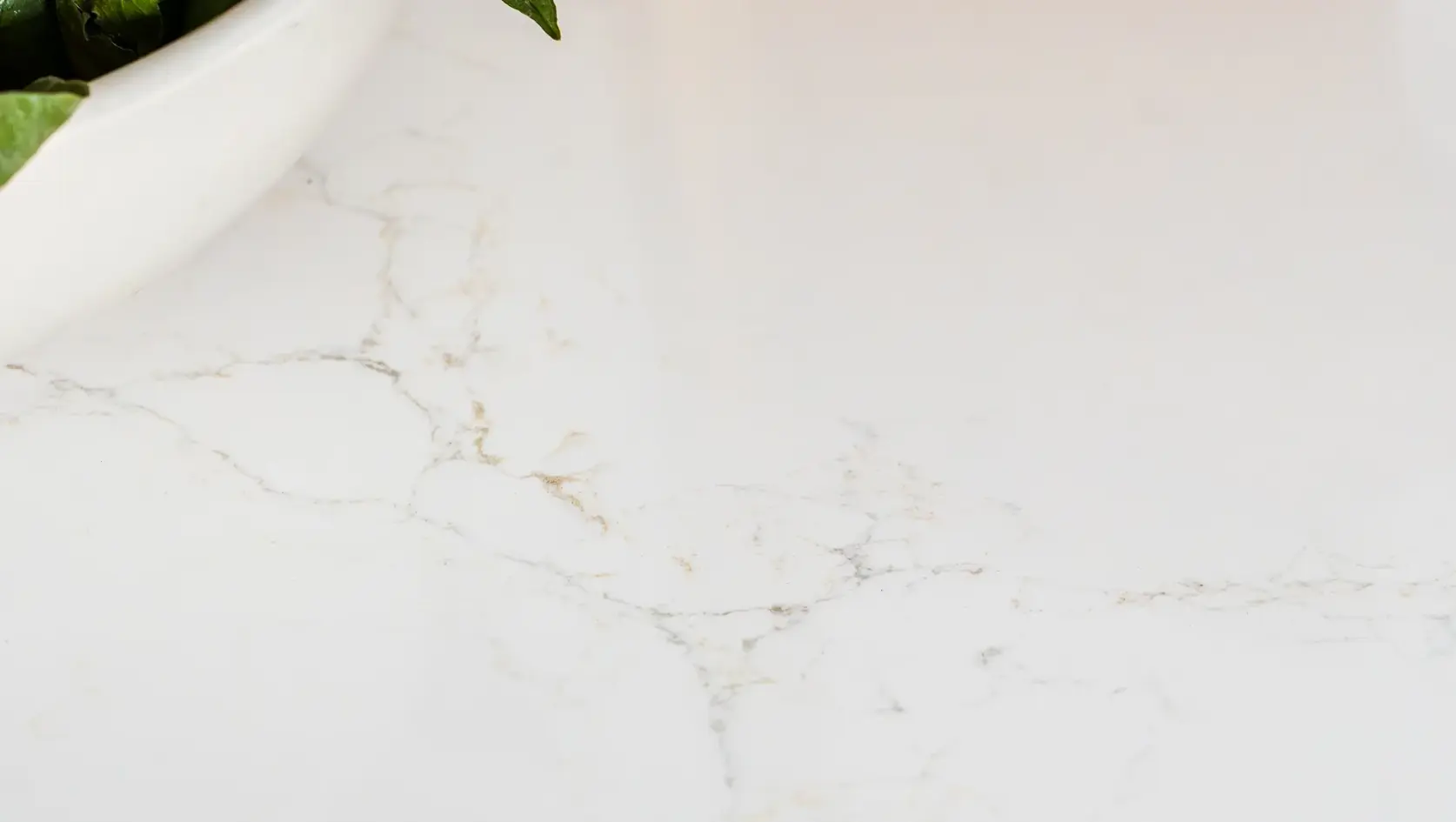 Hanstone Antello Elegant White Quartz with Soft Grey & Gold Veining - Plumbing Market