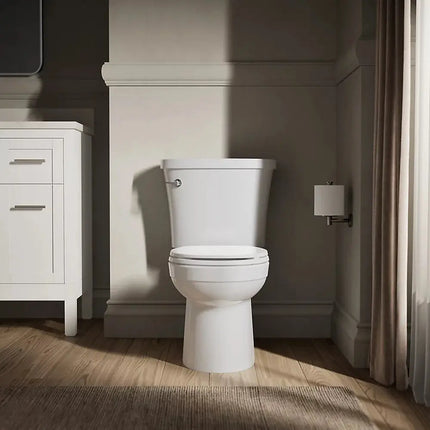 Kohler Kingston Two-piece round-front toilet, 1.28 gpf - Plumbing Market