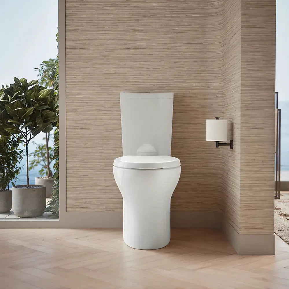 Kohler Persuade Curv Two-piece elongated toilet with skirted trapway, dual-flush - Plumbing Market