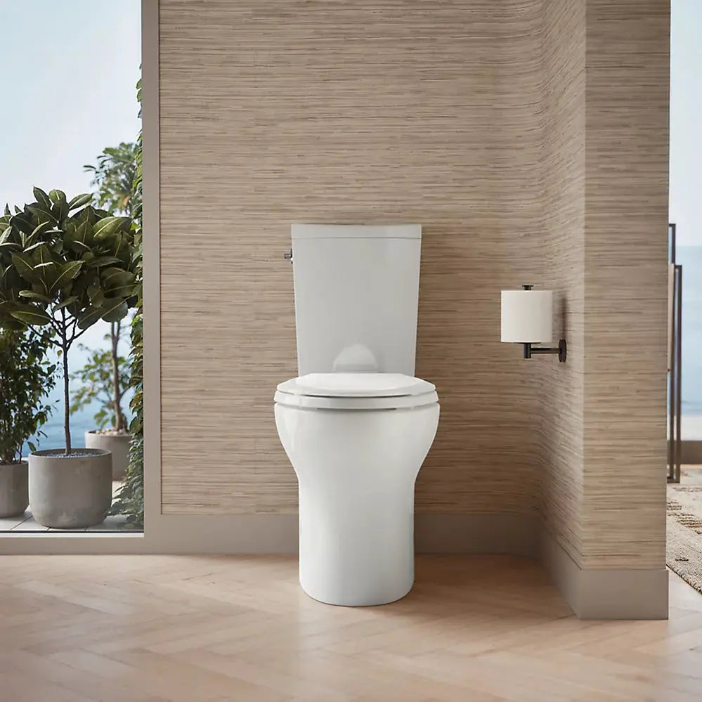 Kohler Persuade Curv Two-piece elongated toilet with skirted trapway, dual-flush less seat - Plumbing Market