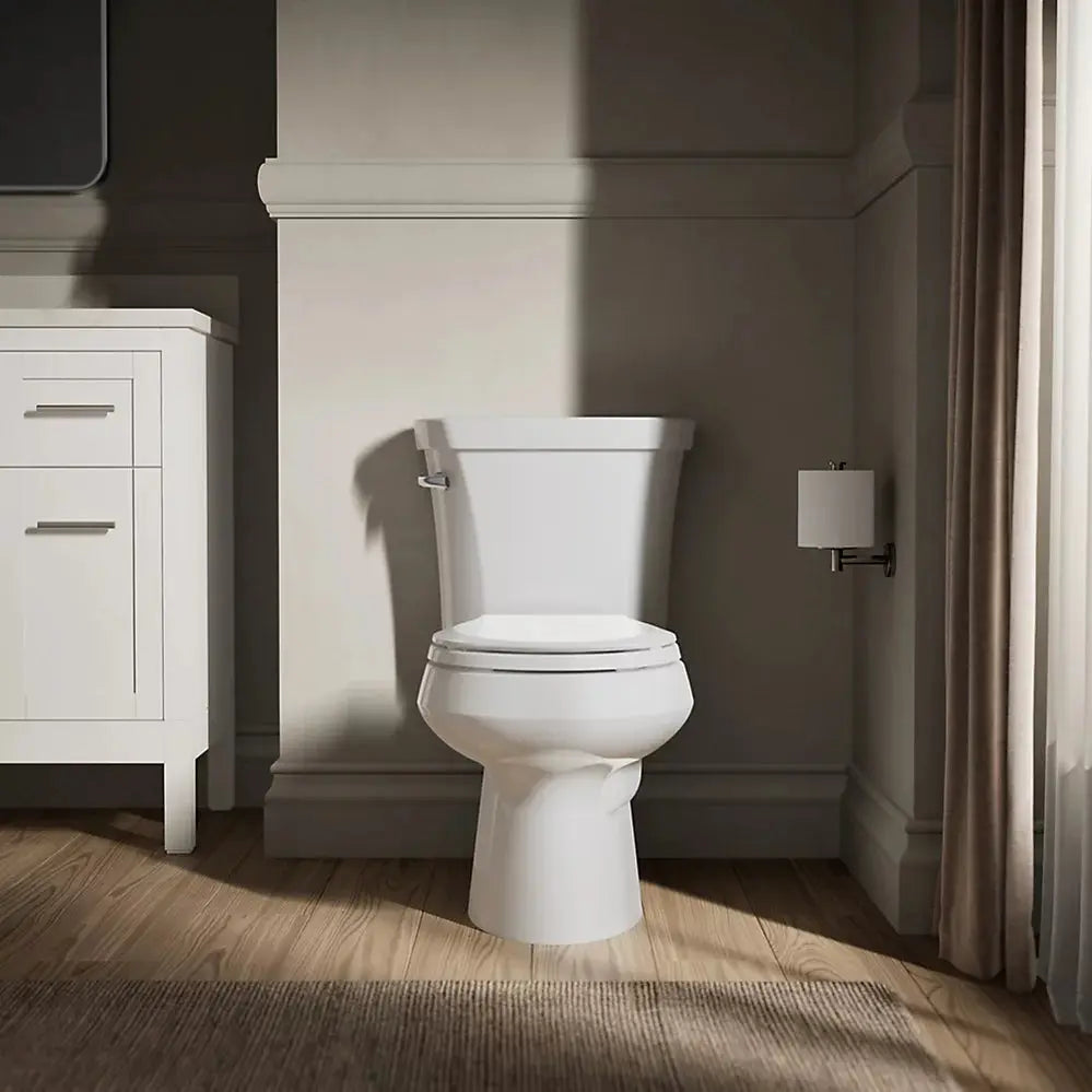 Kohler Wellworth Two-piece round-front toilet, 1.6 gpf Less Seat - Plumbing Market