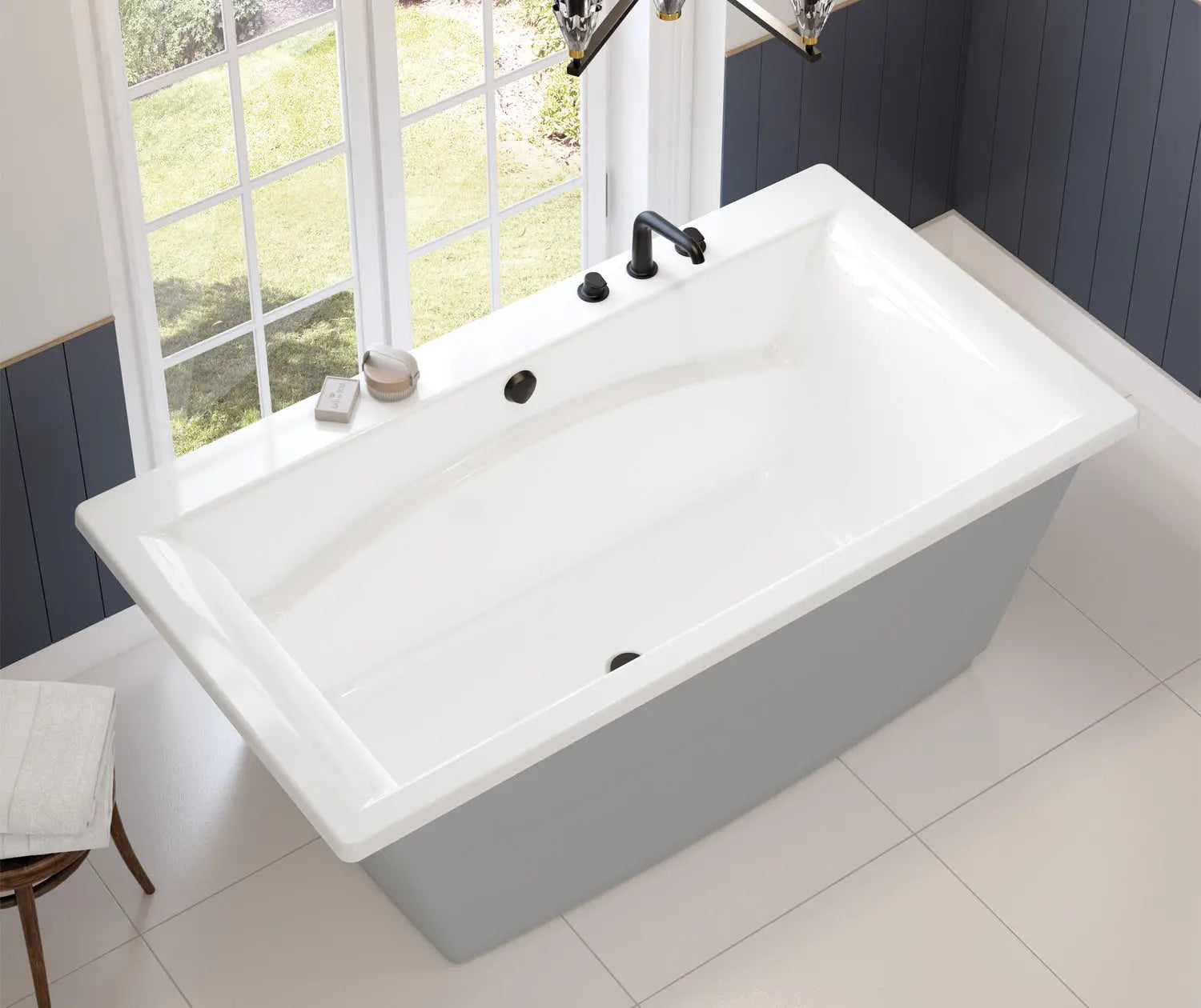 Optik 6636 F Acrylic Freestanding Center Drain Bathtub in White with Sterling Silver Skirt - Plumbing Market