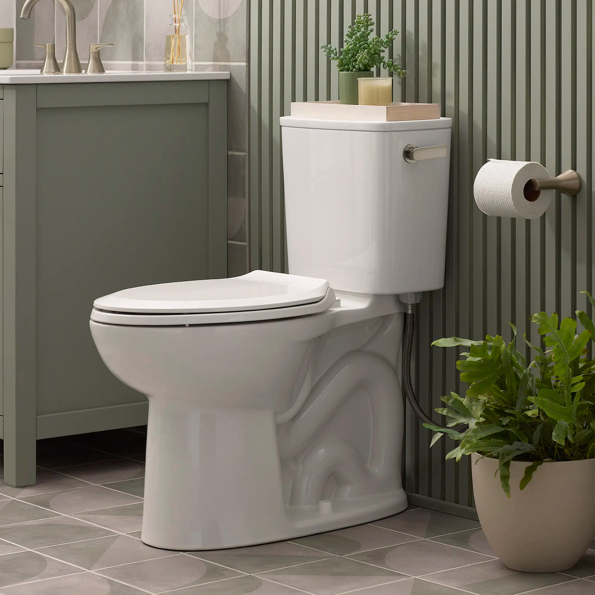 American Standard Aspirations EcoStrength Two-Piece 0.80 gpf/3.0 Lpf Chair Height Elongated Right-Hand Trip Lever Toilet Less Seat - details