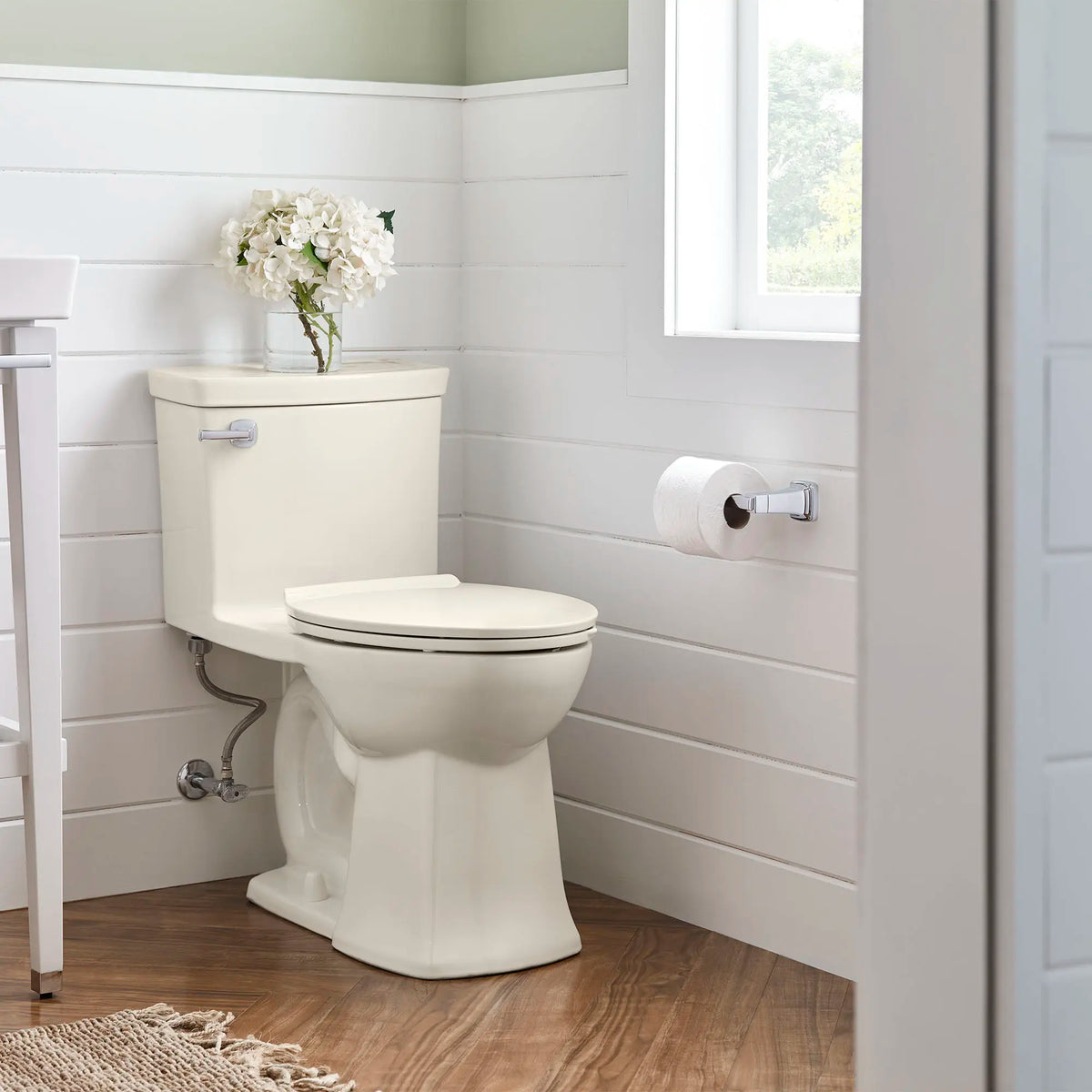 American Standard Townsend VorMax One-Piece 1.28 gpf/4.8 Lpf Chair Height Elongated Toilet with Seat - details